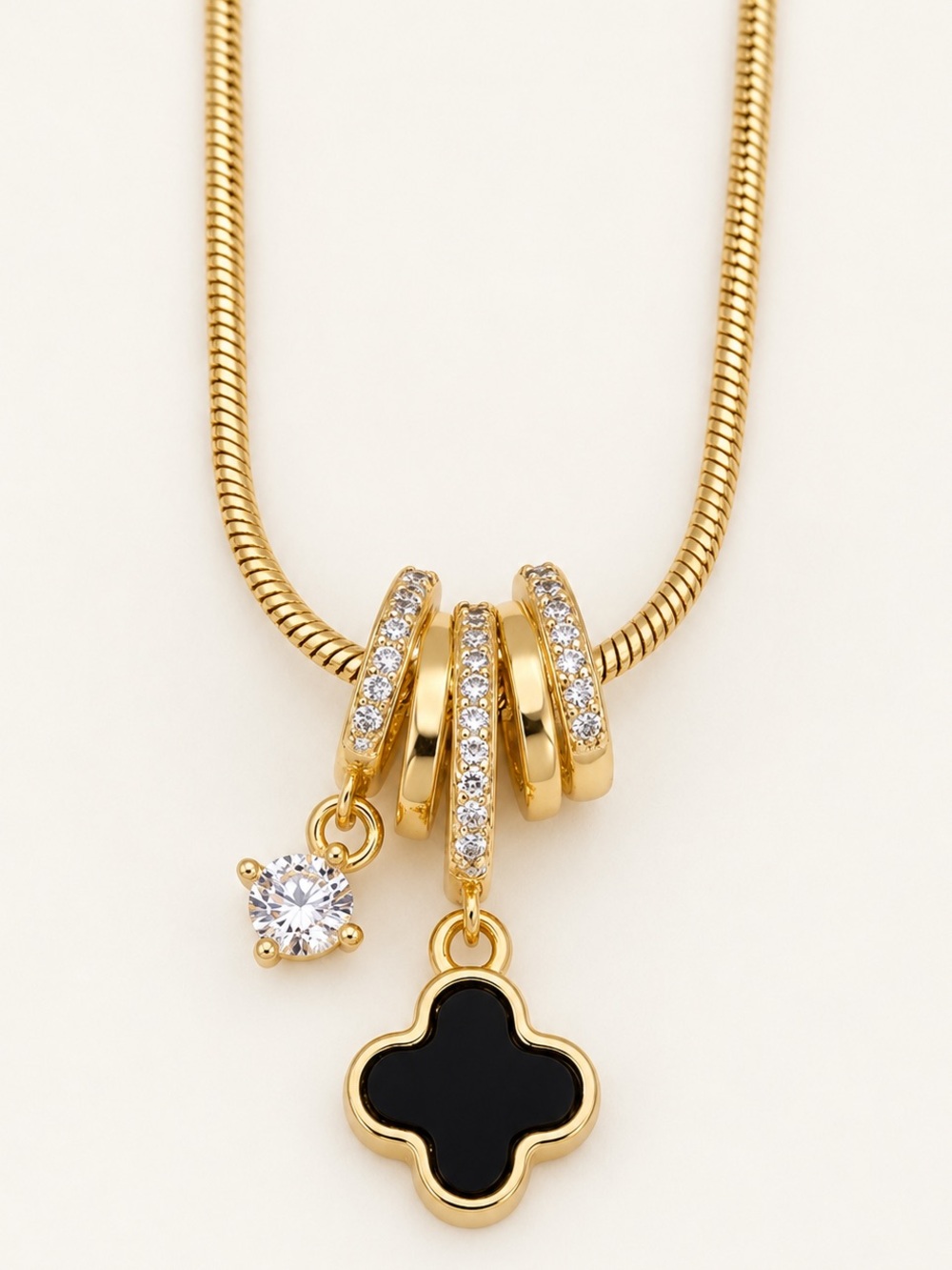 14K Gold Plated Smoky Black Clover Necklace | CZ Pavé Rings & Crystal Charm